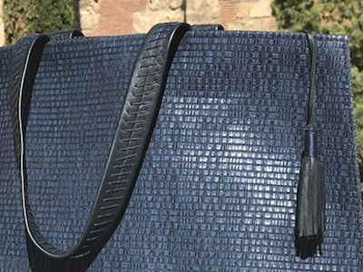 Hand-woven leather holdall