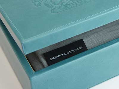 A bespoke suit or jacket in a box